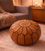 Handmade Moroccan leather ottoman pouf used as footstool and floor cushion