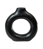 Close-up of modern ceramic hollow ring pot showing smooth matte glaze finish and geometric ring opening