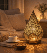 Copied!Moroccan handmade brass table lamp with hand-engraved floral body and fabric shade warm amber light