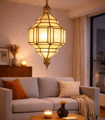 Moroccan milk glass hanging lamp with brass fittings casting warm diffused light