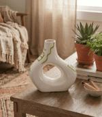 Handcrafted Cream Ceramic Vase with Sculptural Cut-Out and Sage Green Accents