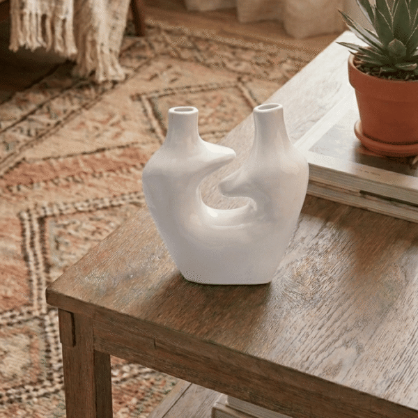 White sculptural ceramic vase with dual spouts and hollow center modern home decor