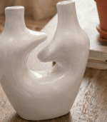 Handcrafted White Sculptural Ceramic Vase with Dual Spouts and Hollow Center - Image 5