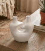 Handcrafted White Sculptural Ceramic Vase with Dual Spouts and Hollow Center - Image 2