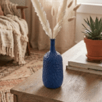 Handcrafted blue ceramic bottle-shaped vase with elegant finish for modern home decor