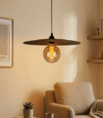 Handmade terracotta saucer pendant lamp crafted from fired clay with a modern disc-shaped design