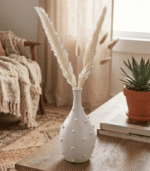 Handmade white ceramic bottle-shaped vase with minimalist modern design for home decor