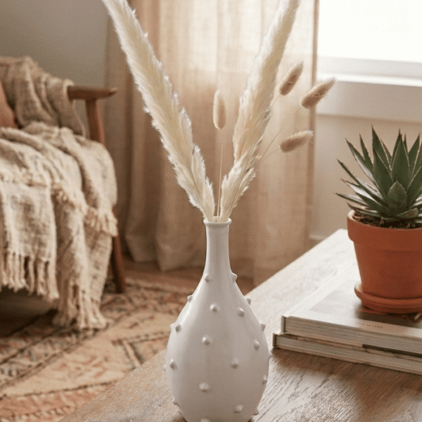 Handmade white ceramic bottle-shaped vase with minimalist modern design for home decor